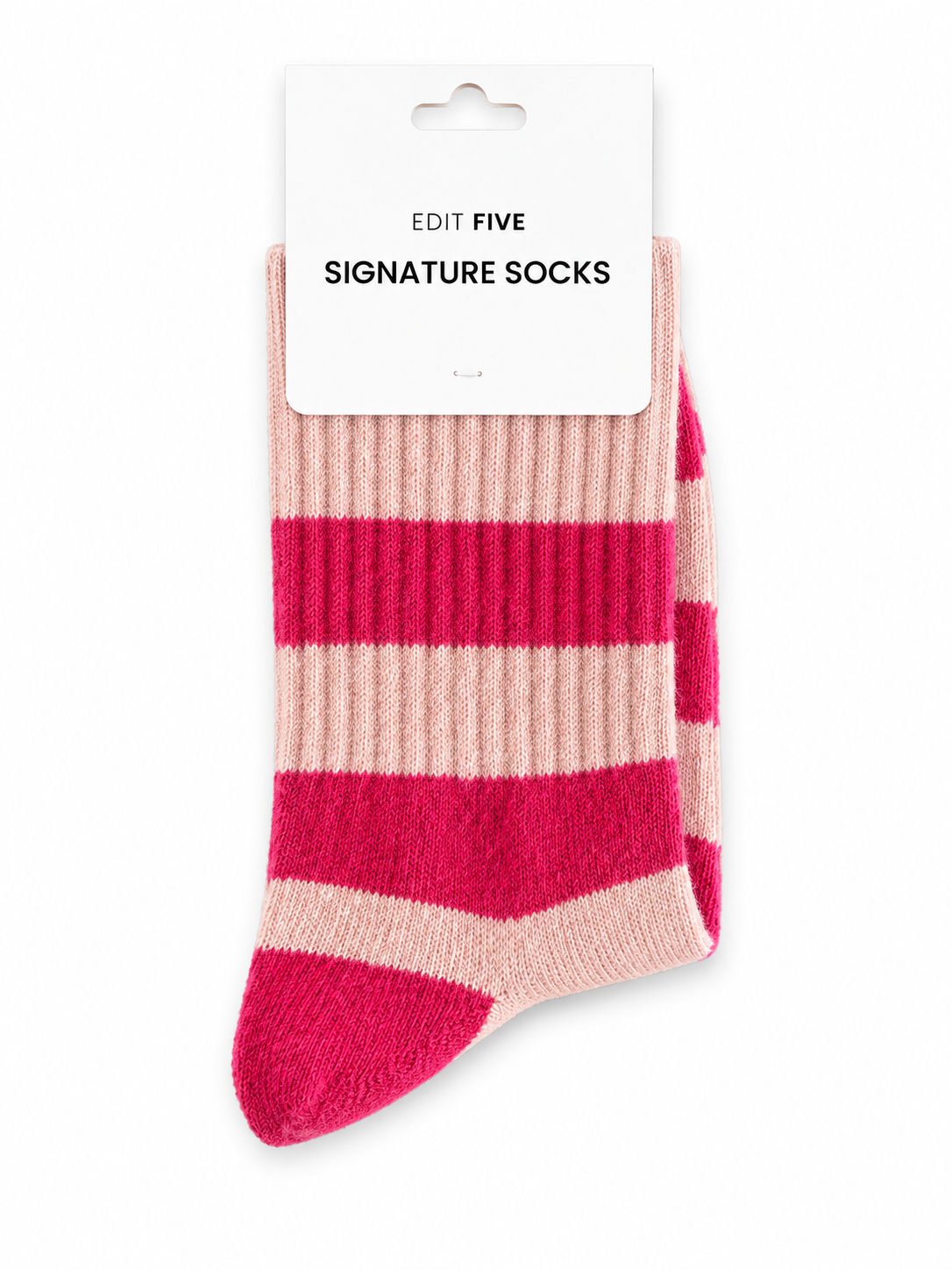 A pair of ribbed knit socks with horizontal stripes in pink and a light peach-beige, attached to a white cardboard hanger card that reads 'EDIT FIVE SIGNATURE SOCKS'. Soft pink striped socks for women with a warm wool blend, durable construction and flexible stretch fit, ideal for everyday outfits, lounging, winter wear and colourful sock gifts.